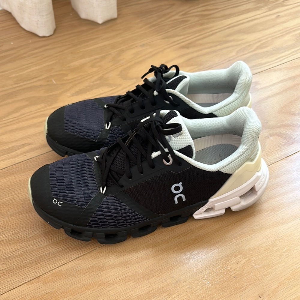 On Running Black and White Sneakers